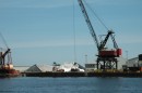 A crane works on the Norfolk waterfront.