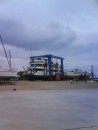Heavy lift day in the yard. This tripper boat being put back into the water.