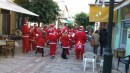 Band of Santas on Christmas Eve in town.
