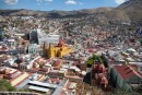 Overlooking Guanajuato from the Pipila Monument. It shows the center of town,  the Jardin Union (green) the basilica and the Theater Juarez (bottom right).