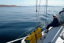 Anita enjoying the warm sun and calm conditions. The San Lorenzo Channel is in the background with Balandra bay in the distance and Cerralvo Island in the far distance.
