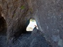 A hole through the cliff.