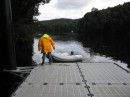 This photo shows Shawn tying up the dingy at the floating dock near Sir John