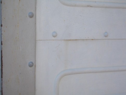 Here is a closeup of the construction detail by the front door.  The thing is just riveted together.