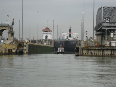 Here we are approaching the first lock on the Pacific side of the canal.  There are two locks in a row at what is called the Miraflores locks.