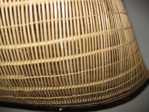 This photo shows some of the detail of one of the baskets in the previous photo.  The intricate design and workmanship is impressive but no more impressive that a tiny basked I bought for my Mom from an artist named Mama Aka on Palmerston Atoll in the Cook Islands.