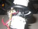 This badly focused photo shows the lower of the two LED clusters (only one row of LEDs needed for this anchor light) and the way it was attached to the fixture.  This fixture is located at the mast head and sees a lot of motion at sea.  It is important that everything have good mechanical strength.  This photo was obviously taken before the wires had been soldered into place.  All of the wiring for these lights is soldered in place and sealed inside heat shrink tubing to completely lock out moisture.