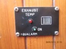 This photo shows the little alarm panel that warns us when the exhaust temperature has risen above 200 F.