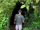 One of the "highlights" of our tour of the Santa Cruz highlands was a walk through a 1/4 mile long lava tube.  This was a creepy experience.  The cab drive left us off at one end of the tube and told us that he would meet us at the other end.  At least we thought that was what he was saying.  After walking down a switch back trail we came to the entrance to the lava tube.  Here is Shawn getting ready to enter the tube