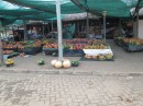 This is a wider shot of the market showing very large stocks of fresh fruit and vegetables.  almost everything was ripe and it was hard to believe that most of this produce would be sold before it got too old.