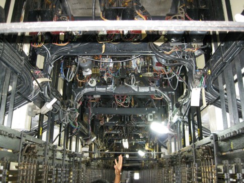 This is what the control system looks like from the floor below.  Paul says he took Hilary Clinton in here on her tour and the secret service got concerned when she seemed to disapear.  This system depended on mechanical levers and servo motors to execute the commands of the staff.
