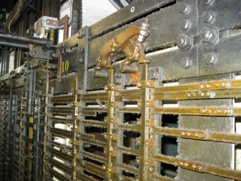 There is an elaborate systems of levers that were designed to prevent catastrophic errors (like opening the valves before the gates closed.  This was in the day before a logical switch was a little black chip on a circuit board. 