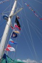 We dress our boat at each port, but also fly the following flags off our port stay from top: RVYC burgee, Fighting Kiwi, British Ensign, BC flag, Seven Seas and Blue Water burgees and EMYR flag