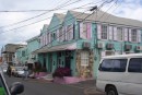 The matching flowers at this pink and blue building were beauty to the eye. 
