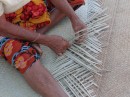 Grammas of the villages often seem to be the ones weaving the mats.