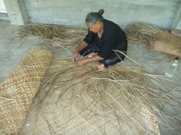Weaving mats for export. 