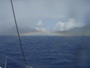 This had been the year of the rainbows. This one was so odd. Very low, very brilliant. Taken in Portsmoth, Dominica.
