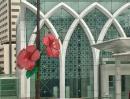 Decorative streetlamps in Kuala Lumpur: The red hibiscus is Malaysia