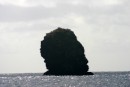 Profiles of Jimmy Hendrix and Bob Marley unite in this big rock at the entrance to Hanamenu Bay 