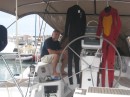 Tom takes a break after re-attaching the reefing lines 