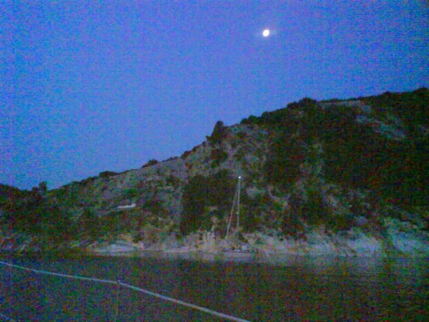 A moonlit night at anchor.