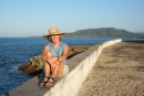 Beth on seawall in Baracoa