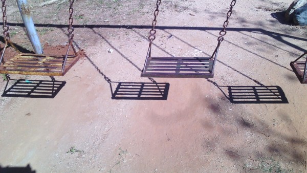rusty seats on swing....before