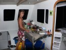 Annette making pizza in her galley on our first night at anchor.