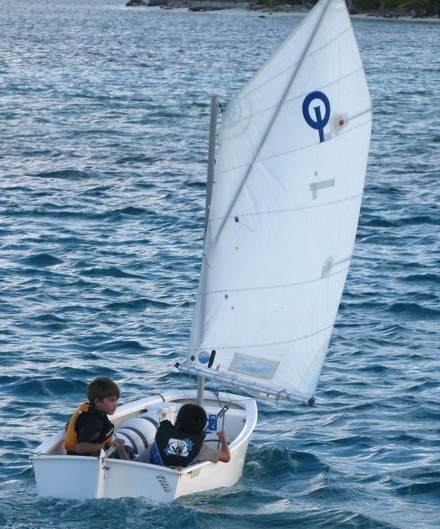 Cole and Oscar taking a sail in the Opti