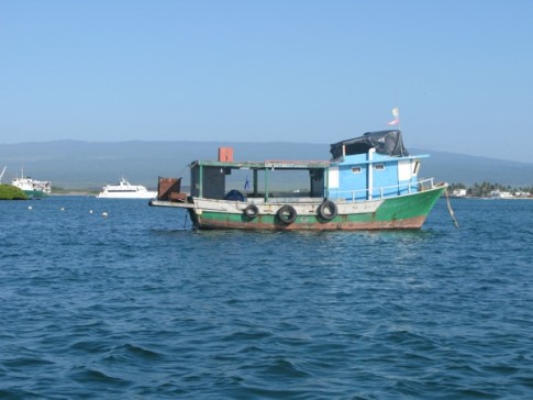 Typical boat in the harbor at Isabela