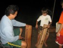 Cole learning the local drums at a residence in Fatu Hiva, Marquesas