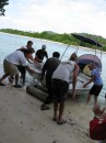 Tom and cruisers help launch a boat for Laura that had been in storage - Niuatoputapu, Tonga