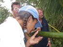 Cammi enjoys bamboo water at peak of volcano in  Tafahi, Tonga