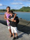 Cammi and Cole waiting for their school bus on Niuatoputapu, Tonga