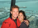Tom and Monique in Sky Tower w/Viaduct Marina in background - happy to have made it all the way to NZ!