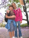Cam and Cole under the jacaranda trees