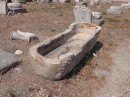 Bathtub or crypt but probably bathtub as all burial remains were removed from island during purification.