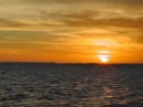 sunset at Alcora Bay around Cape Don