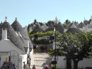 Alberobello: Note the different caps to the roofs, they are symbols for a family or for luck.