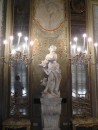 Palazzo Reale Museum: Statuary between every wall chandelier.