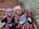 Wat Phro That Doi Suthep: Cute, innocent, decorated girls that demanded money after Virginia snapped their picture.