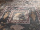 This floor mosaic depicted one way they would carry and pour them.