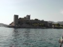Castle of St. Peter is situated in the Bay between the marina (behind the castle in this picture) and the anchorage.  This is taken from our anchorage spot -you can see the fishing reel that sits on the side rail of Libertad in the bottom right of pic (haven