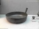 Archaeological Museum. Bronze Age skillet -to go on top of the ceramic wood stove.