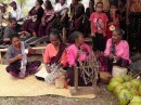 women weaving baskets
