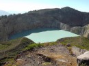 the blue lake - looked like thick paint - green lake visible in far right - seemingly thin wall of rock separating the green and blue lakes yet such different minerals creating the different colors