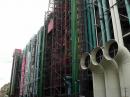 Pompidou art museum with colorful functional elements on exterior.