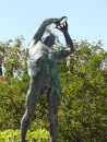 statue of a discus competitor outside the stadium