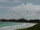 Beach launching kite boarders.
