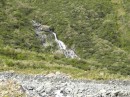 cascading stream down the hillside enroute to glacier